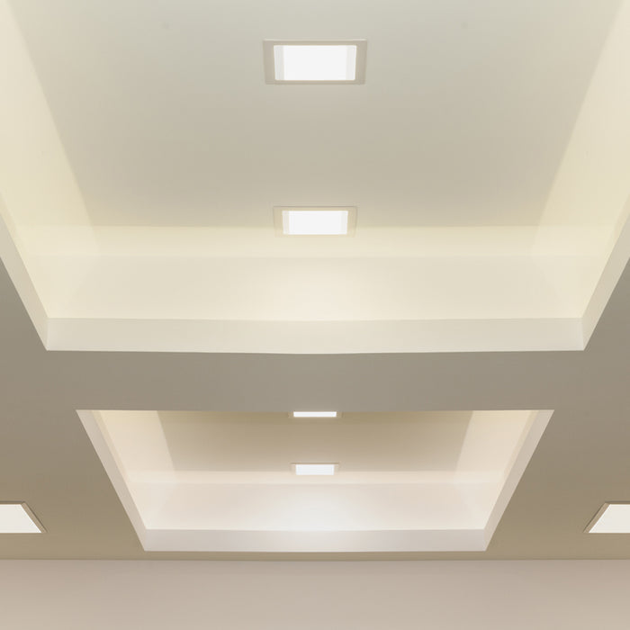 A series of Square Recessed Lighting on a ceiling.